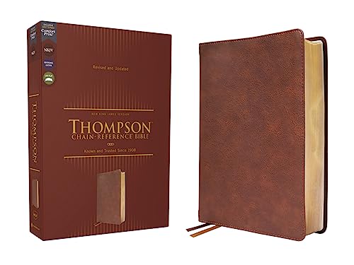 Brown leathersoft Bible with gold-edged pages, shown with its box.