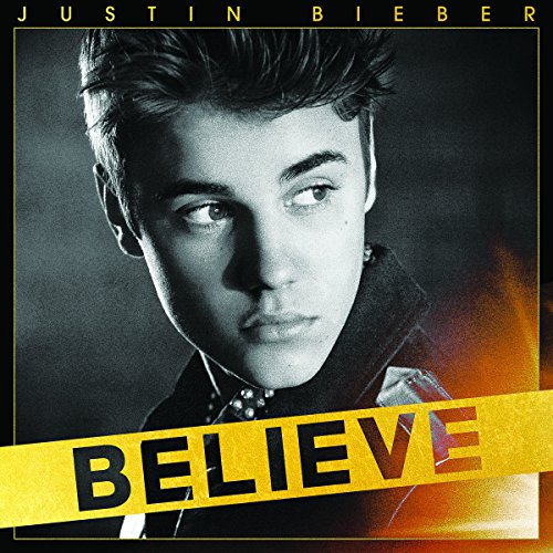 Justin Bieber’s “Believe” album cover on a black vinyl record.