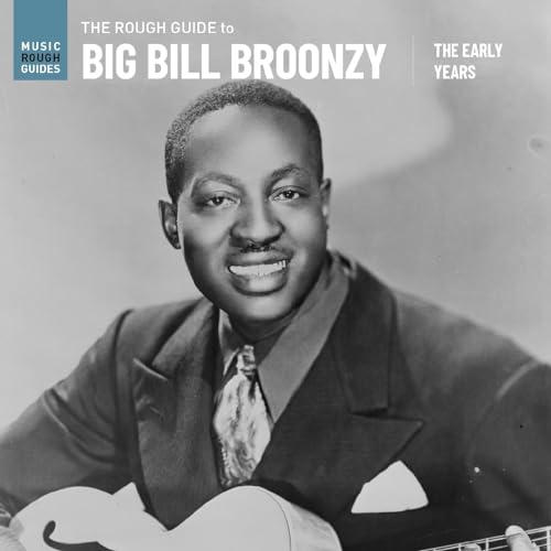 Black and white portrait of blues musician Big Bill Broonzy with a guitar.