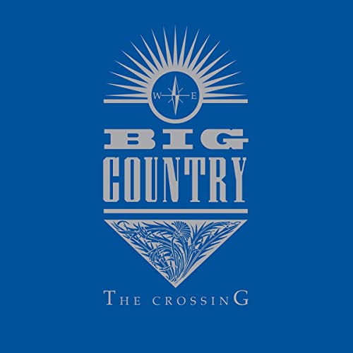 Blue album cover with a silver compass, Big Country logo, and floral triangle design.