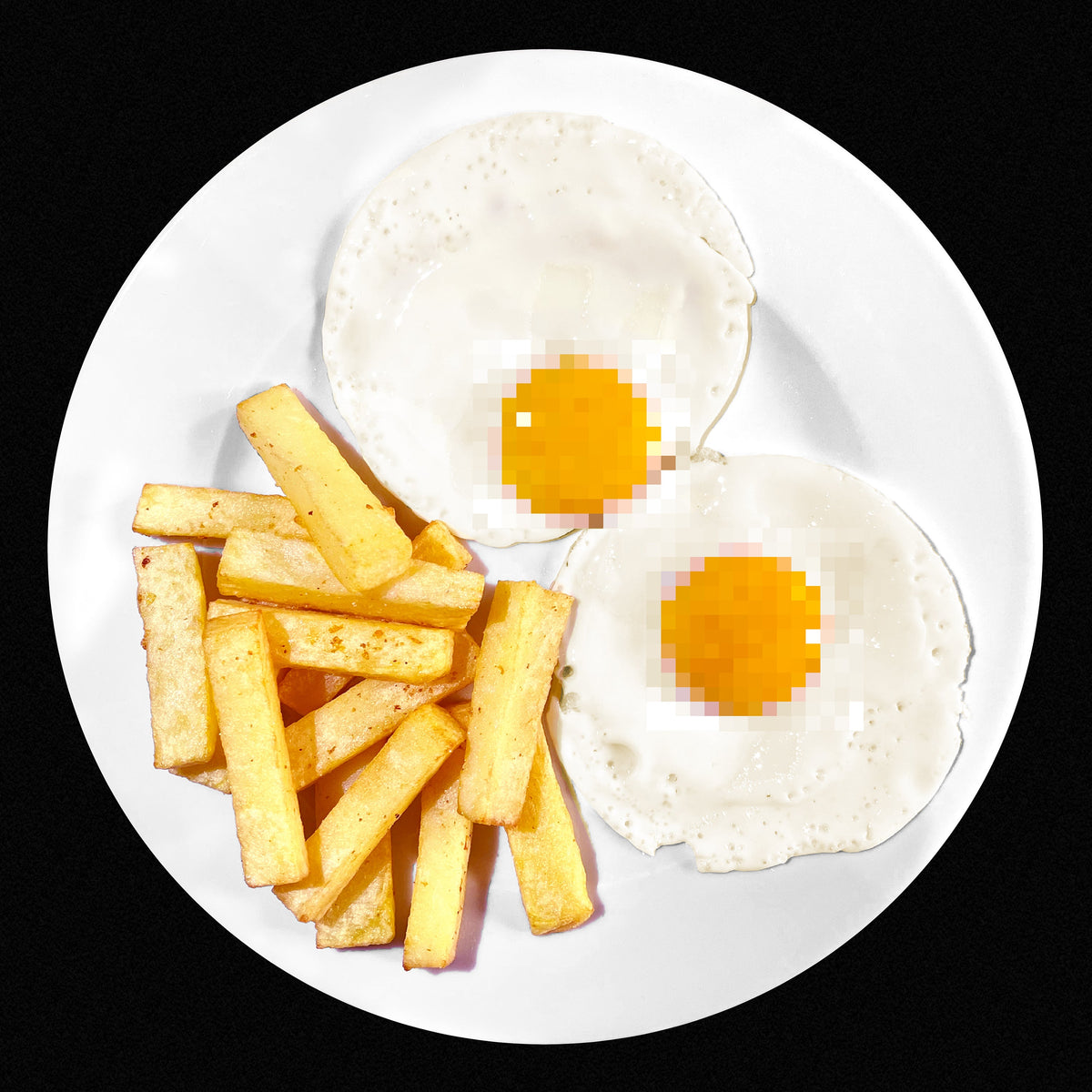 Pixelated fried eggs and fries on a white plate against black.
