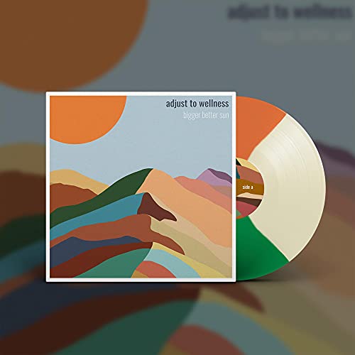 Vinyl record and album cover featuring abstract colorful mountains and a large orange sun.