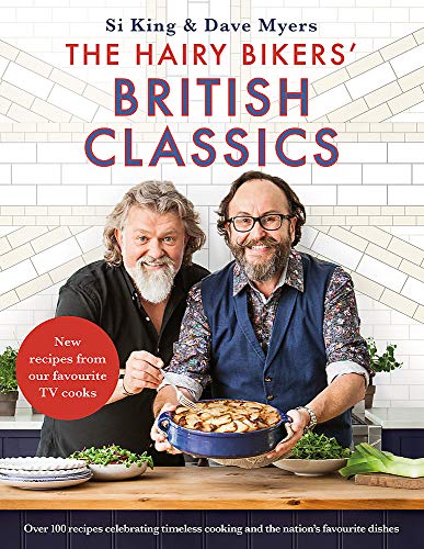 "Cookbook cover featuring two men holding a dish, with a kitchen background."