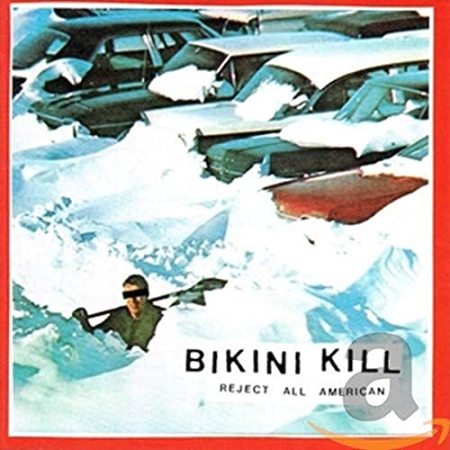 CD cover: Bikini Kill, “Reject All American,” with snowy car wreckage.