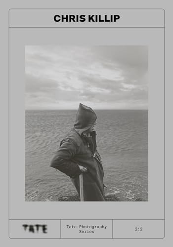 Book cover featuring a black and white photograph of a hooded figure by the sea.
