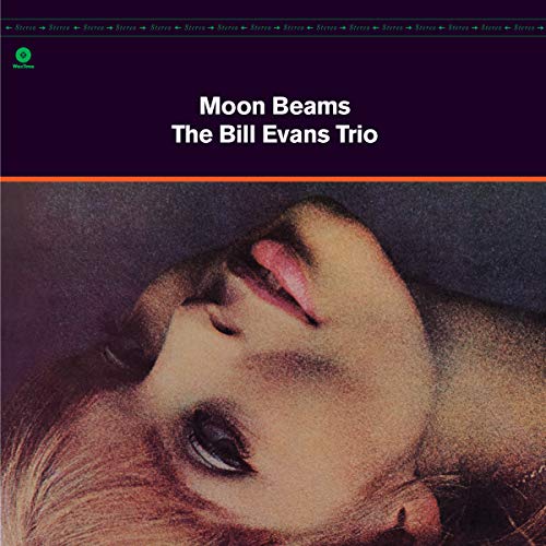 Album cover for The Bill Evans Trio Moon Beams featuring a close-up portrait.