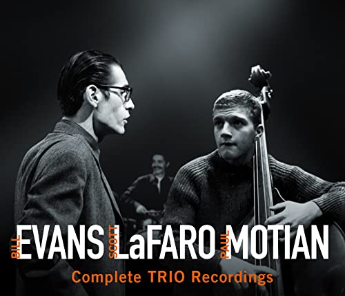 Black and white photo of jazz musicians Bill Evans, Scott LaFaro, and Paul Motian.