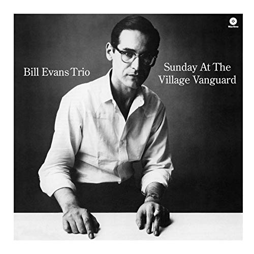 Black and white album cover featuring pianist Bill Evans in glasses.