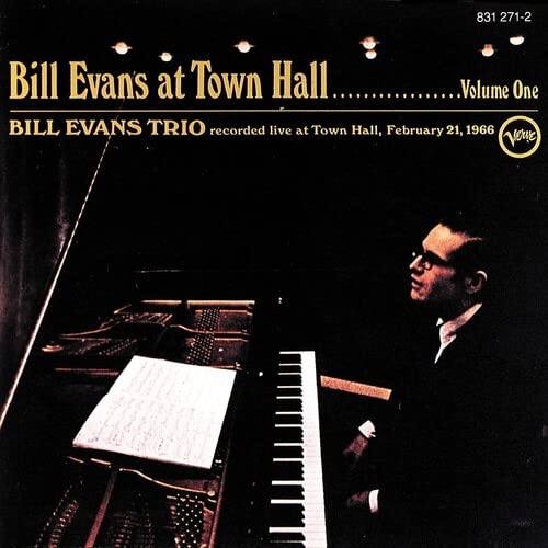 Bill Evans Trio album cover featuring a pianist at a grand piano.