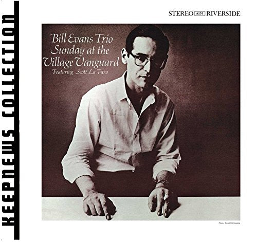 CD cover featuring black and white portrait of pianist Bill Evans.
