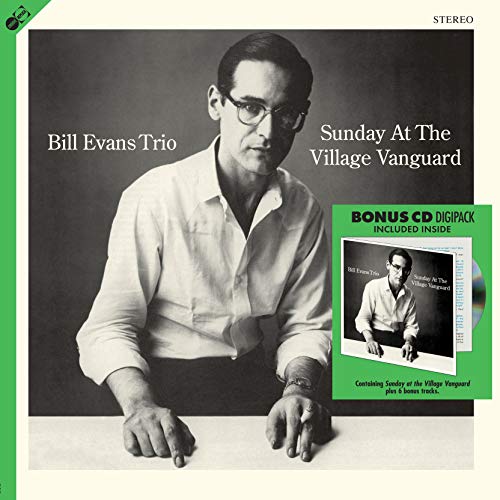 Bill Evans Trio album cover: portrait of Evans with text and bonus CD.