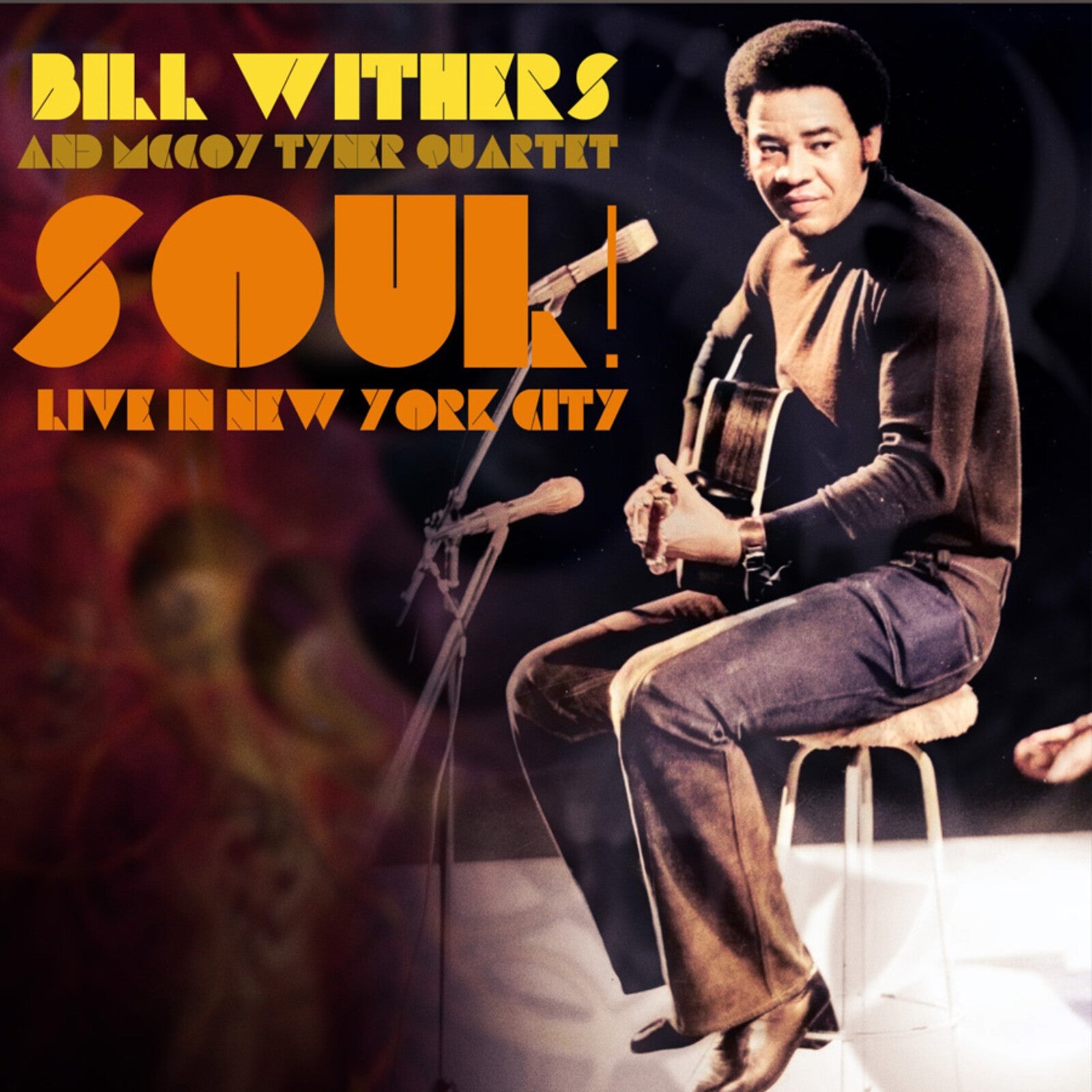Album cover featuring Bill Withers sitting on a stool with an acoustic guitar.