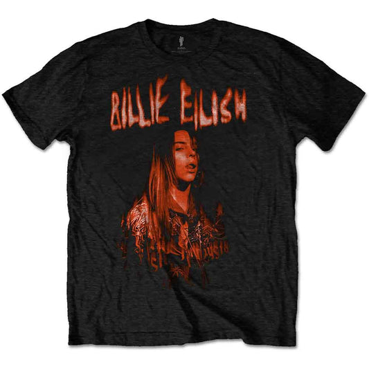 A man wearing a black t-shirt featuring a Billie Eilish portrait and orange text.