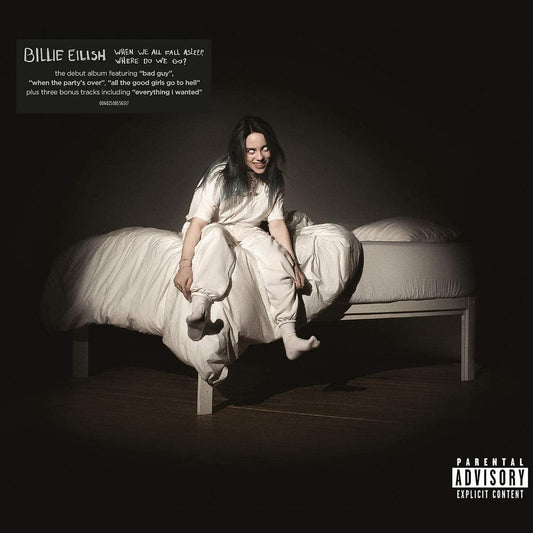 "Billie Eilish sitting on a bed in white, against a dark background."