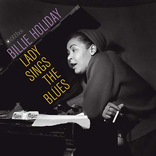 Black and white portrait of Billie Holiday with album title overlay.