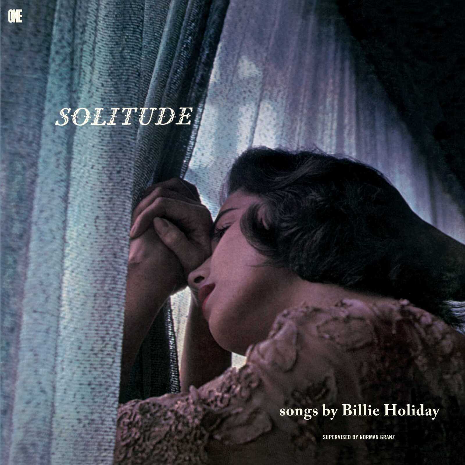 Billie Holiday portrait on vinyl album cover, dark blue and silver tones.
