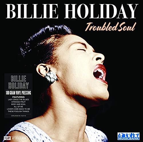 Billie Holiday portrait on "Troubled Soul" vinyl record cover, black background.