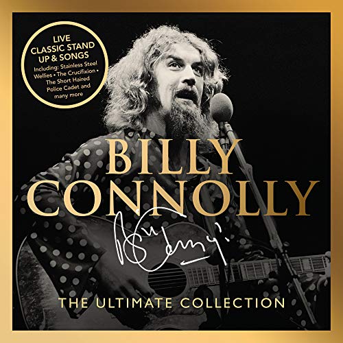 Black and white photo of Billy Connolly playing guitar and singing into a microphone.