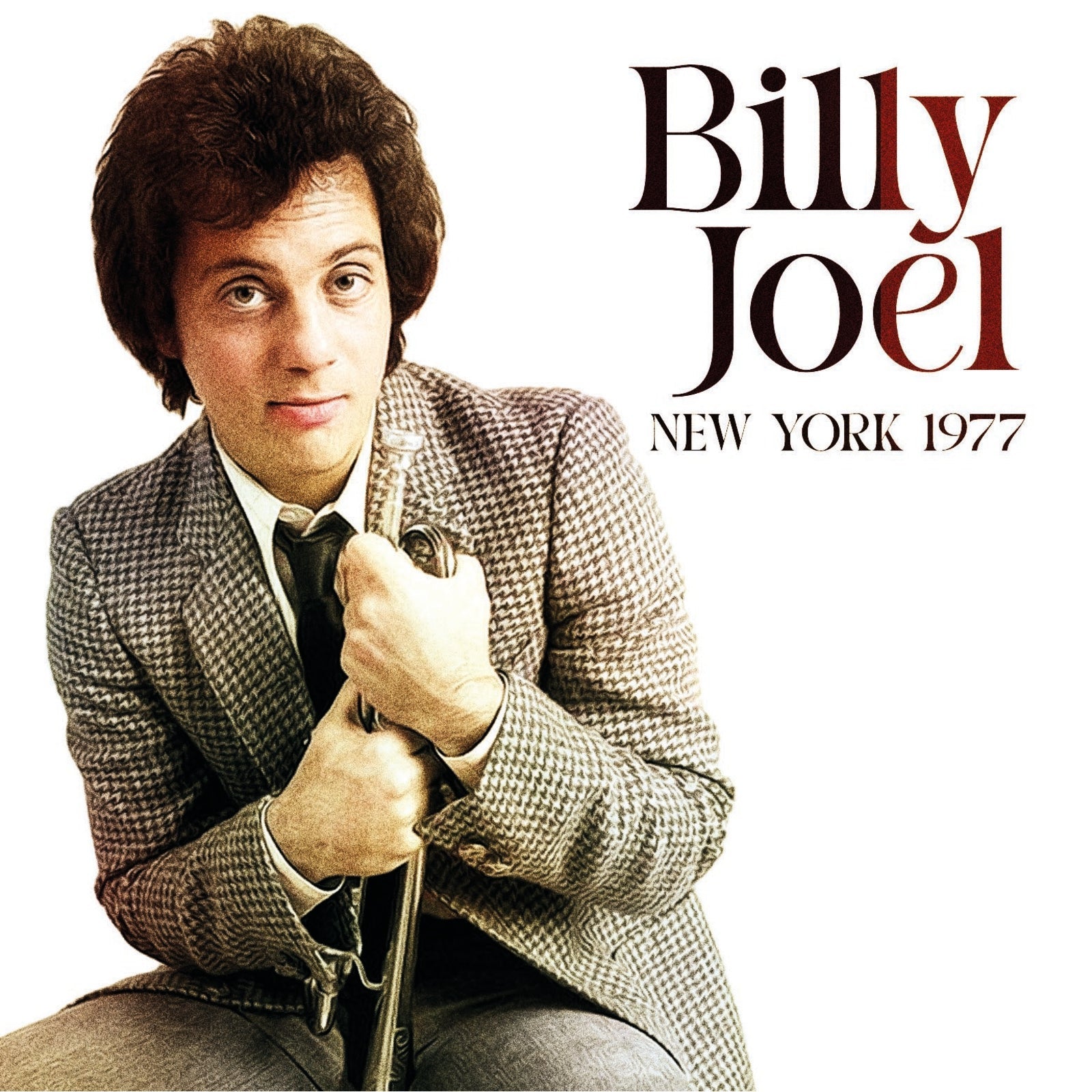 Billy Joel album cover, portrait of singer in a tweed jacket.