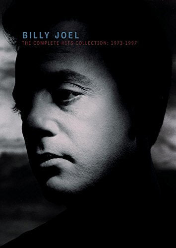 Black and white portrait of Billy Joel on a CD album cover.