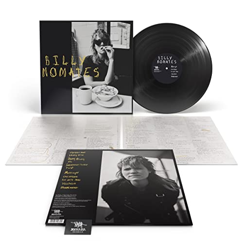 Vinyl record, album cover, lyric sheets, and back cover featuring black and white photography.