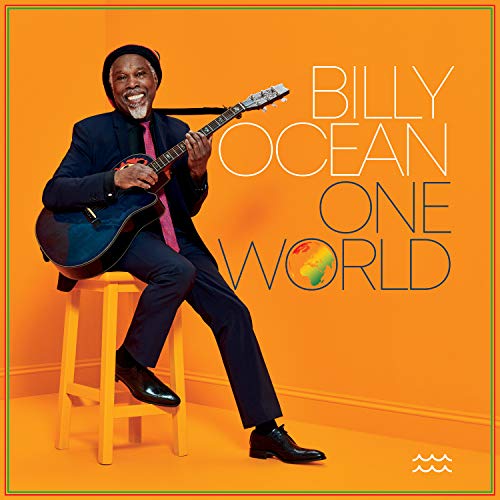 Billy Ocean sits with a guitar on an orange album cover.