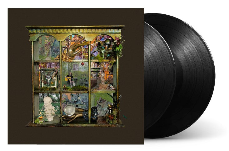 Billy Strings album cover: ornate diorama with a musician playing guitar.