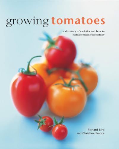 Book cover titled Growing Tomatoes featuring a cluster of red and orange tomatoes.