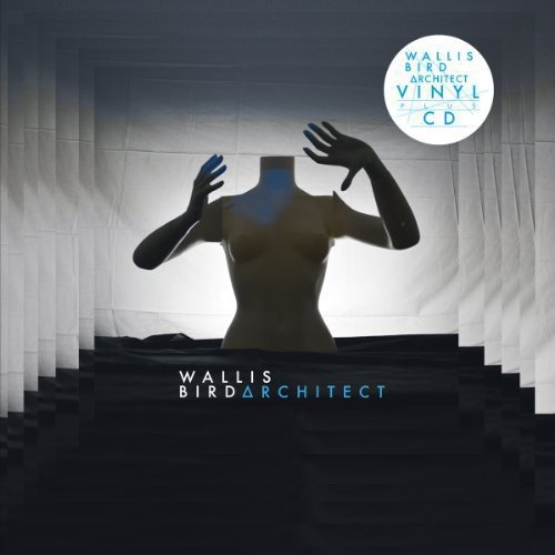 Album cover: Torso with raised hands against a stairwell backdrop.