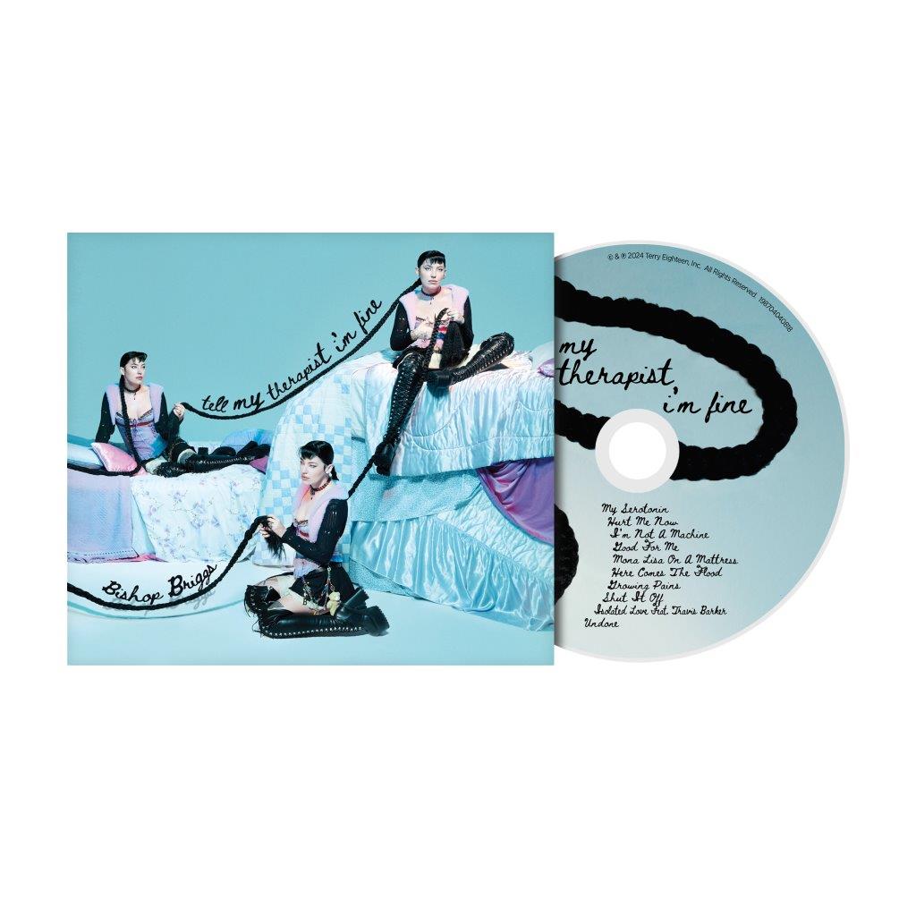 Bishop Briggs CD cover: artist in black and white with bold pink text.