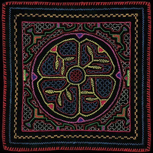 Black square textile with colorful, intricate geometric embroidery.