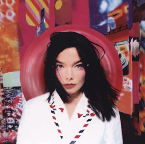 Björk portrait with a large red circle and colorful, layered background.