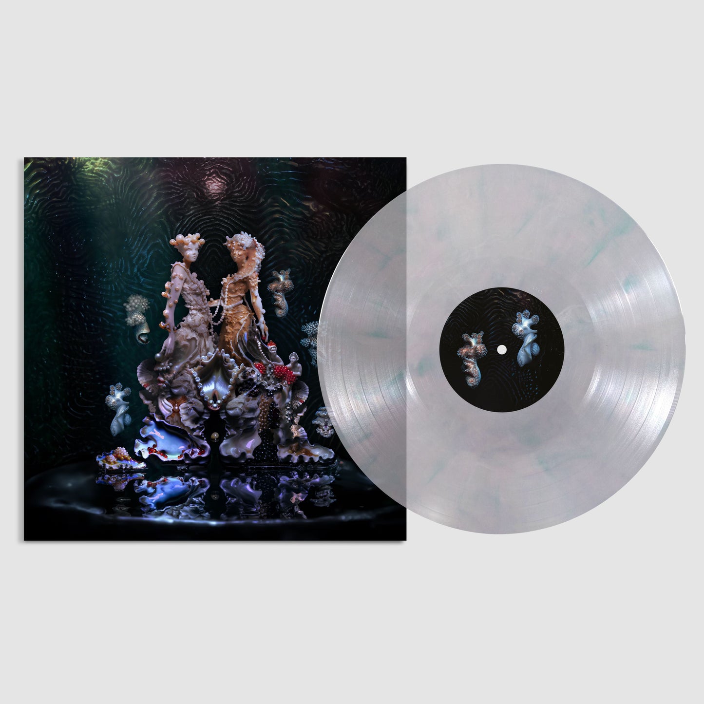 Björk and Rosalía album “Oral” vinyl record with textured cover art.