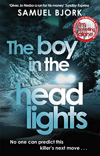 Book cover for The Boy in the Headlights showing car headlights on a snowy road.