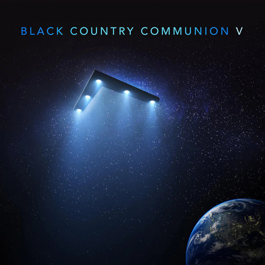 A V-shaped spacecraft with glowing lights flies in space above the Earth.