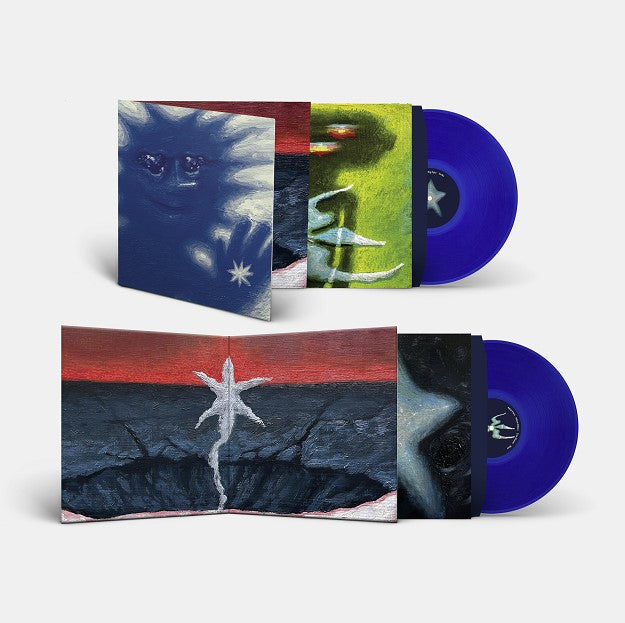 Two blue vinyl LPs with painted album covers featuring abstract figures.