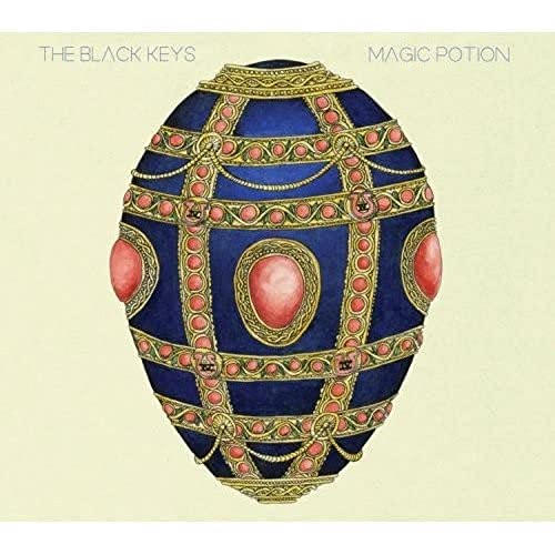 The Black Keys’ “Magic Potion” CD cover: ornate, dark blue and gold oval.