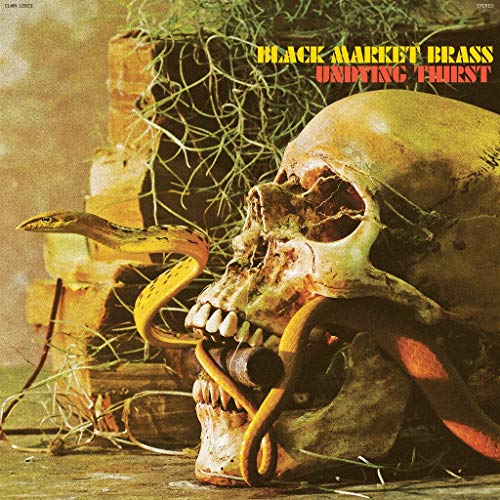 Album cover: skull with snake, grass, and stacked wooden boxes.