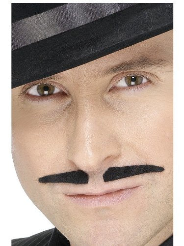 "Cartoon man's face with removable black mustache on a yellow and pink card."