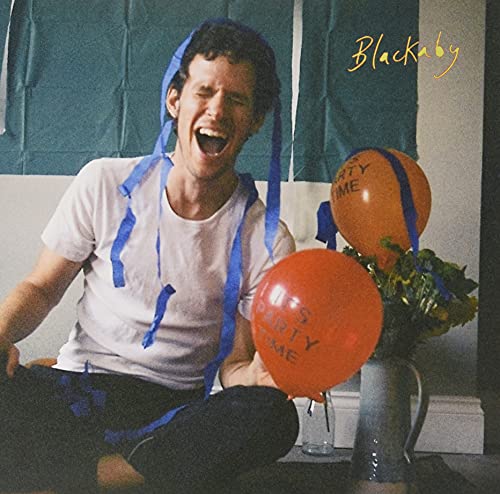 Man with balloons and streamers, album cover for "Blackaby" vinyl.