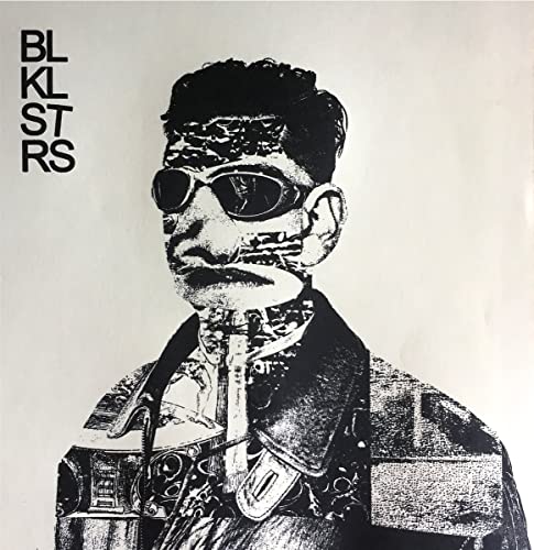 Black and white portrait of a person with sunglasses and textured face.