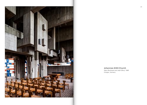 Interior view of the concrete Johannes XXIII Church in Cologne with rows of wooden chairs.