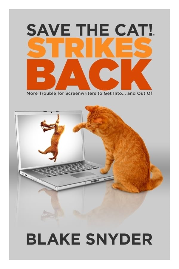 Book cover: "Save the Cat! Strikes Back" with cats and a laptop.