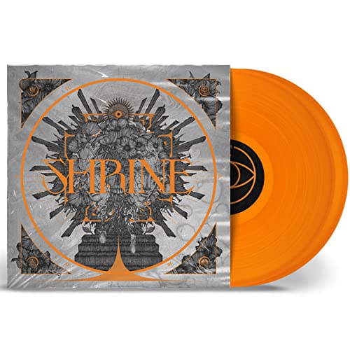 Orange vinyl record and gatefold cover with intricate, dark artwork.