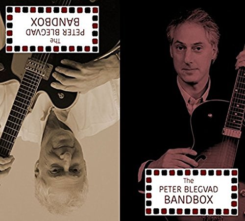 "CD cover featuring a man holding a guitar, with mirrored images and text."