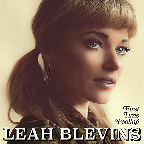 Album cover for Leah Blevins’ “First Time Feeling” featuring a portrait of the artist.