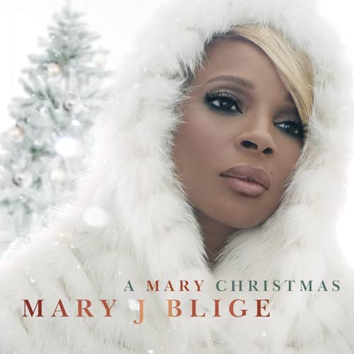 Mary J. Blige album cover, festive portrait with snowy Christmas tree background.