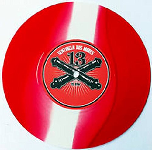 Red and white marbled 7-inch vinyl record with a central label featuring two cannons.