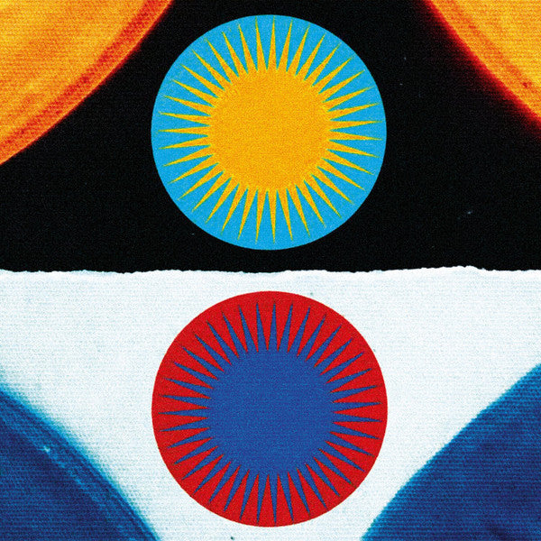 Two colorful, radial-spoked circles on a black and white background.