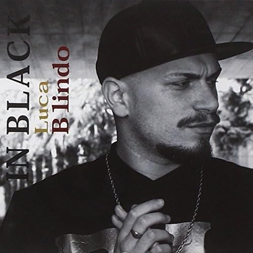 Black and white portrait of a man wearing a cap, album cover.
